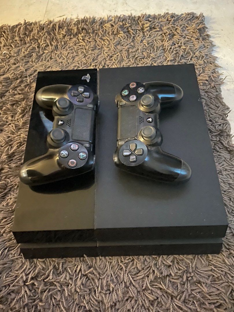 PS4 with two controllers and cd fifa 2020