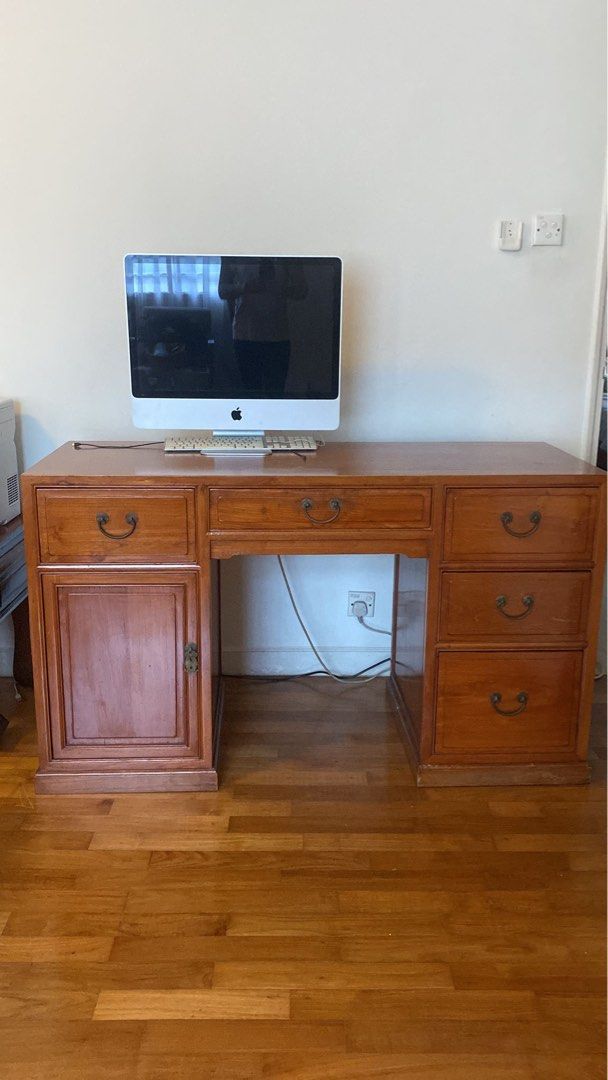 Solid Wood Study Table (Category: Tables & Sets) located in Singapore. Submitted by dips250 (Listing ID 1231086777, Image 1). Description: Sold wood table with good storage Condition 9/10 .