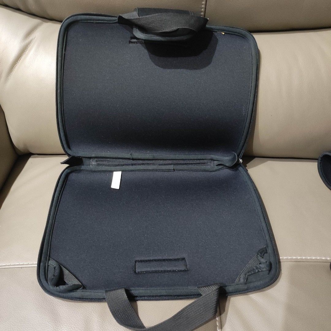 14" laptop sleeve with handle (Category: Laptop Bags & Sleeves) located in Cainta. Submitted by kclosetcleanup (Listing ID 1231411815, Image 2). Description: laptop sleeve with handle good quality foam, no flaws 14" diagonal measurement.