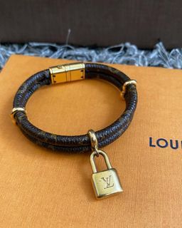 Louis Vuitton Keep It Twice Lock Charm Bracelet Orange Leather
