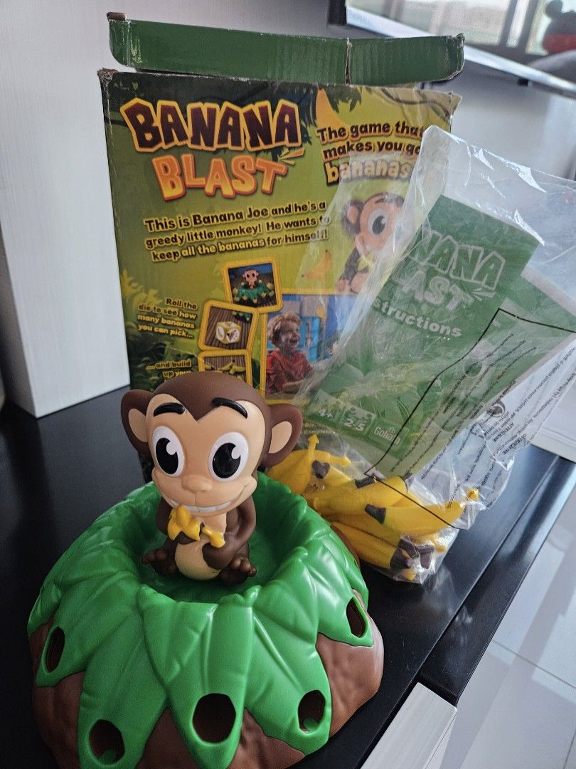  Banana Blast - Pull The Bananas Until The Monkey Jumps Game -  Includes a Fun Colorful 24pc Puzzle by Goliath , Green : Toys & Games