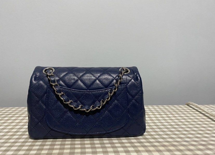 Chanel mini rectangular navy (Category: Bags & Wallets) located in Singapore. Submitted by 1967cookie (Listing ID 1231406340, Image 2). Description: Come with authenticity card, hologram and dustbag. 4 grommets can wear in different way double chain like classic flap. .