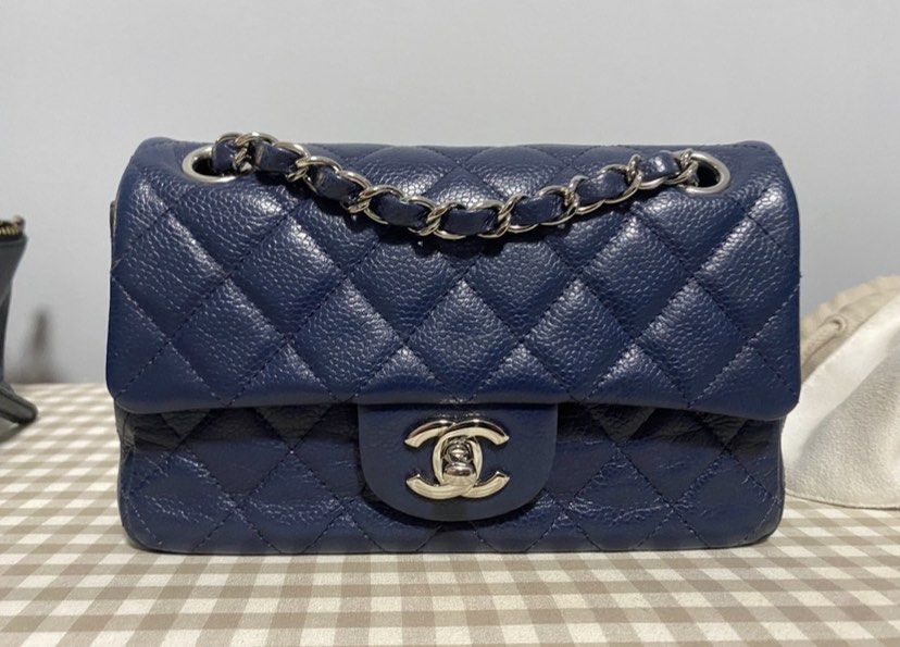 Chanel mini rectangular navy (Category: Bags & Wallets) located in Singapore. Submitted by 1967cookie (Listing ID 1231406340, Image 1). Description: Come with authenticity card, hologram and dustbag. 4 grommets can wear in different way double chain like classic flap. .