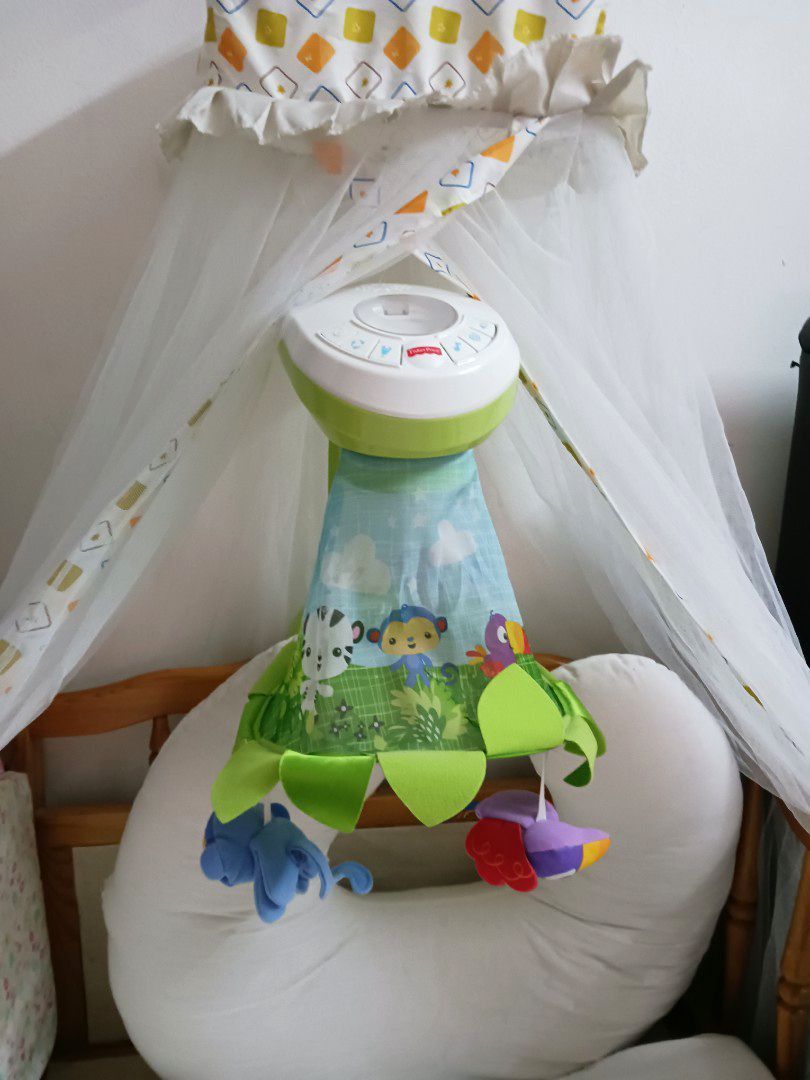 Fisher price grow with me discount projection mobile