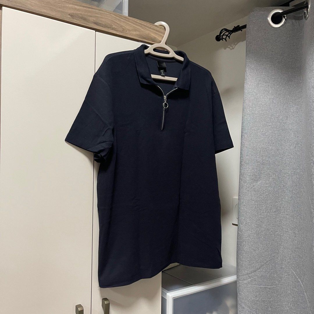 H&M Navy Blue Half Zip Polo Shirt (Category: Tshirts & Polo Shirts ) located in Makati City. Submitted by coldbrewpapi (Listing ID 1231359839, Image 1). Description: Price: 450 Size: XL Fits: Large to 2XL Dimes: 24W x 29L Condition: 9/10.