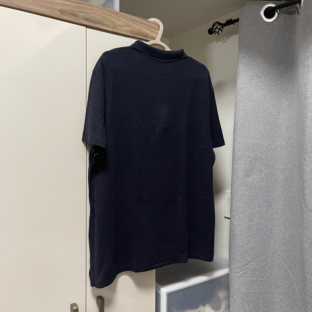 H&M Navy Blue Half Zip Polo Shirt (Category: Tshirts & Polo Shirts ) located in Makati City. Submitted by coldbrewpapi (Listing ID 1231359839, Image 2). Description: Price: 450 Size: XL Fits: Large to 2XL Dimes: 24W x 29L Condition: 9/10.