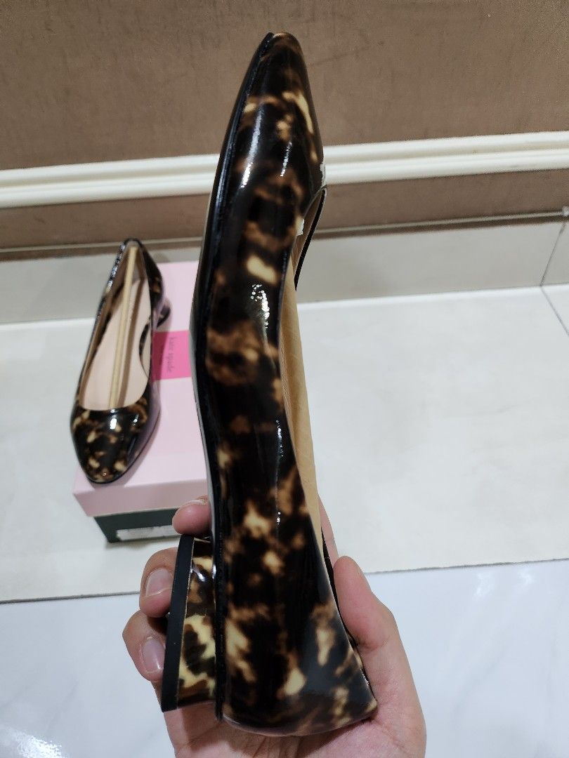 Kate deals spade fallyn