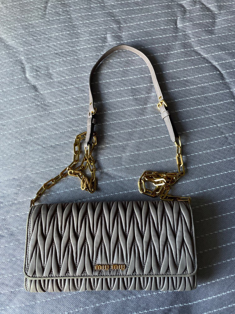 Miu Miu wallet with chain, Luxury, Bags & Wallets on Carousell