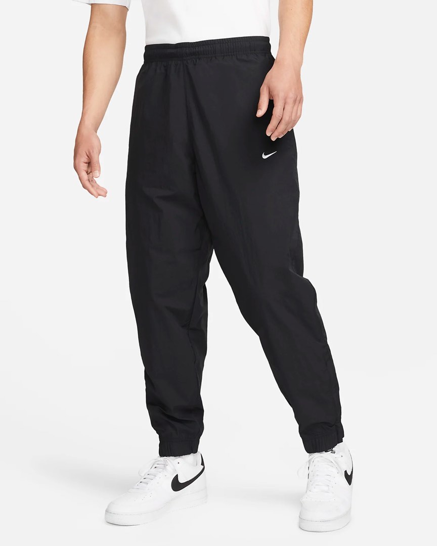 Nike track pants swoosh store