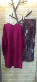 Pleated batwing tunic with pleated batik skirt