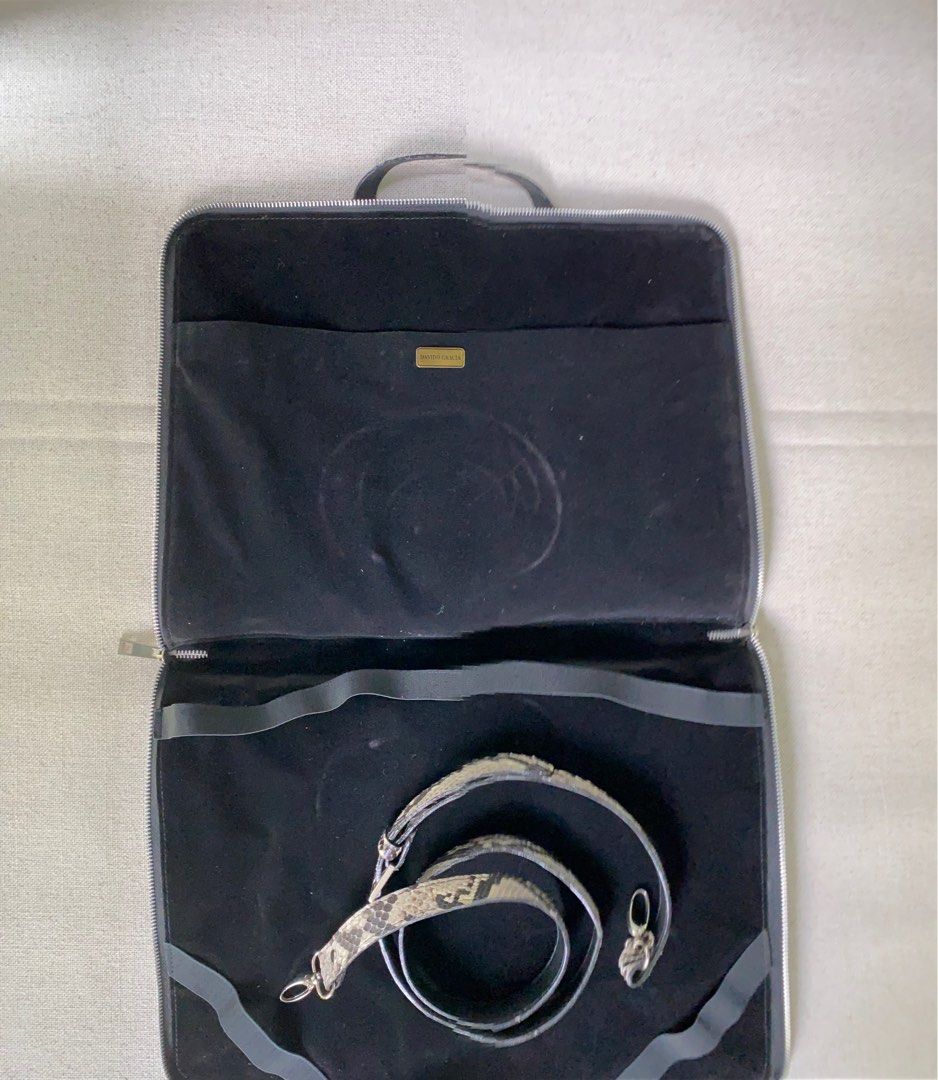 Python brief or computer bag (Category: Briefcases) located in Singapore. Submitted by slowpapa (Listing ID 1231419663, Image 3). Description: A steal : genuine Python leather, need to clear some space, a good fashion item to go to another stylish individual. Price negotiable. .