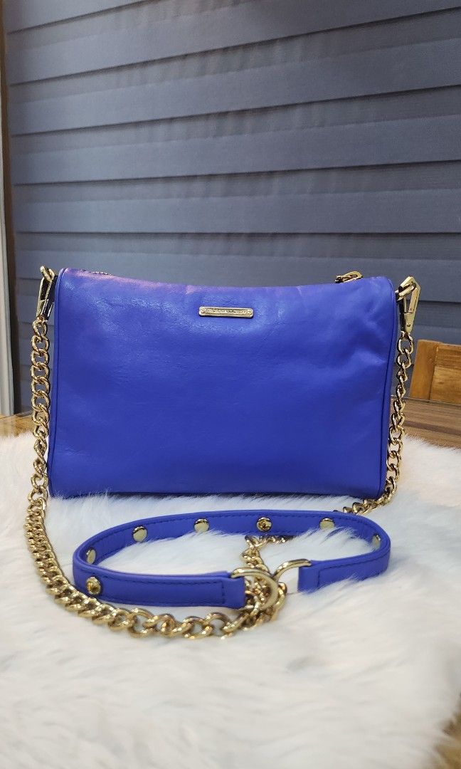 Rebecca Minkoff Mini Five-Zip Crossbody Bag (Category: Luxury Bags & Wallets) located in Daet. Submitted by BagMom (Listing ID 1231294204, Image 1). Description: royal blue color with card and dust bag excellent condition Swipe for detailed pics 👉cash Disclaimer: BagMom is not associated with the brand featured.All copyrights reserved to the original brand holders..