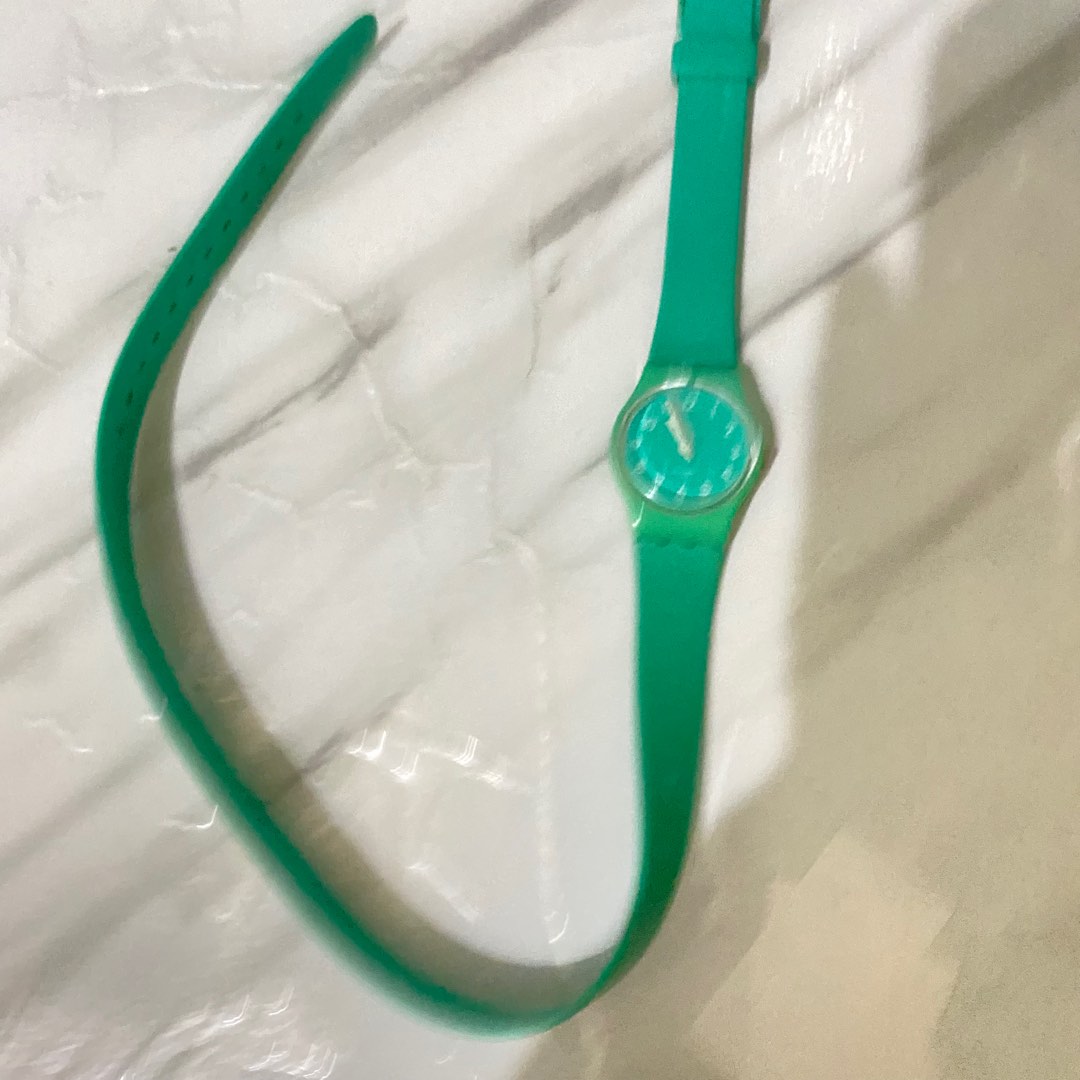 swatch jam lilit watch torquise, Fesyen Wanita, Perhiasan di Carousell