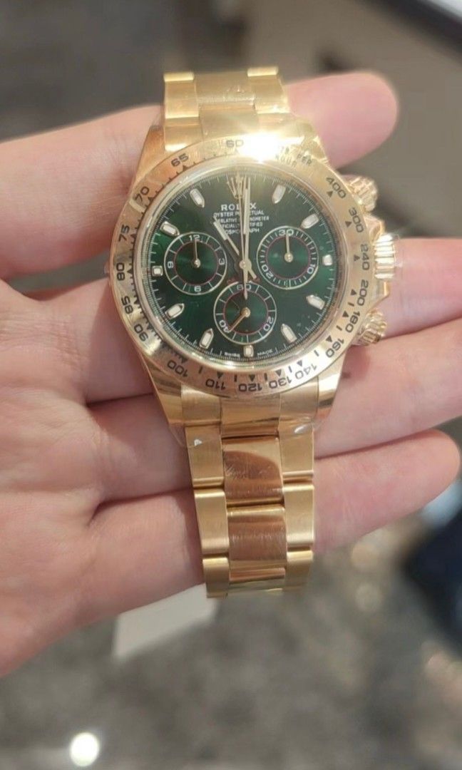 Gold daytona deals green