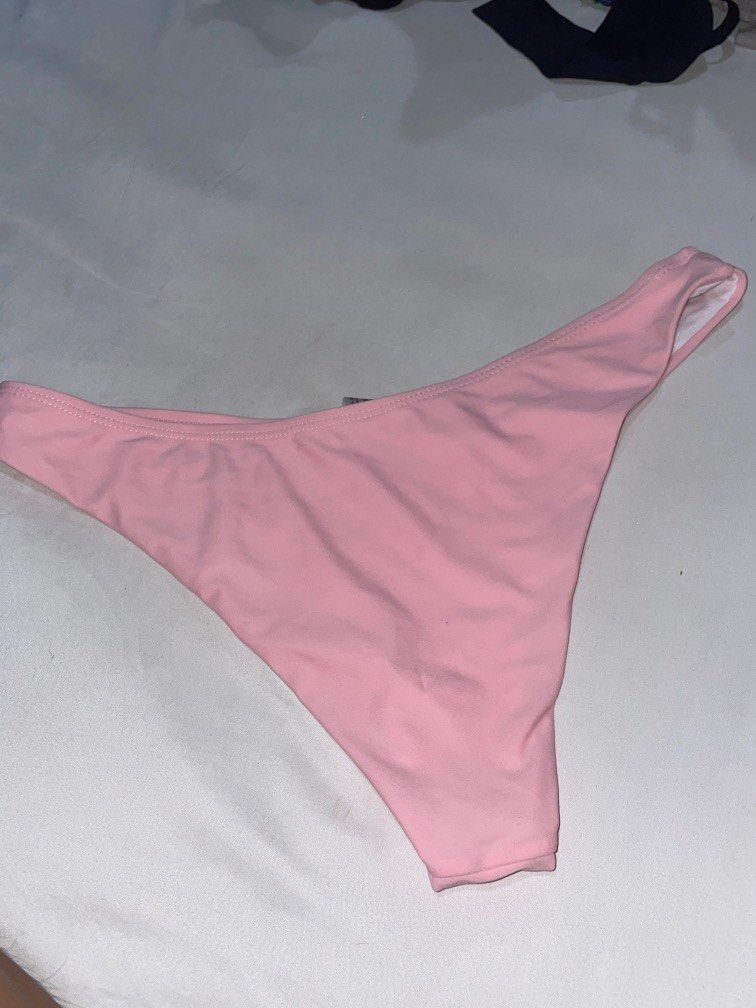 Bikini bottom - bundle (Category: Bikinis & Swimsuits) located in Pasig City. Submitted by psgstuff (Listing ID 1231515545, Image 3). Description: Size on tag: Medium Waist: 14-15 inches Pink: with slight discoloration (not noticeable) Marble: Very low waist style, no flaws No hygienic sticker.
