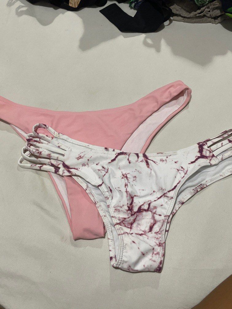 Bikini bottom - bundle (Category: Bikinis & Swimsuits) located in Pasig City. Submitted by psgstuff (Listing ID 1231515545, Image 1). Description: Size on tag: Medium Waist: 14-15 inches Pink: with slight discoloration (not noticeable) Marble: Very low waist style, no flaws No hygienic sticker.