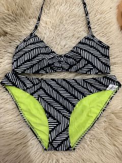 Black and white swimsuit Brandnew w/ original tag Top is padded Bottom has hygiene sticker pa M on tag, up to semi-L  Php200