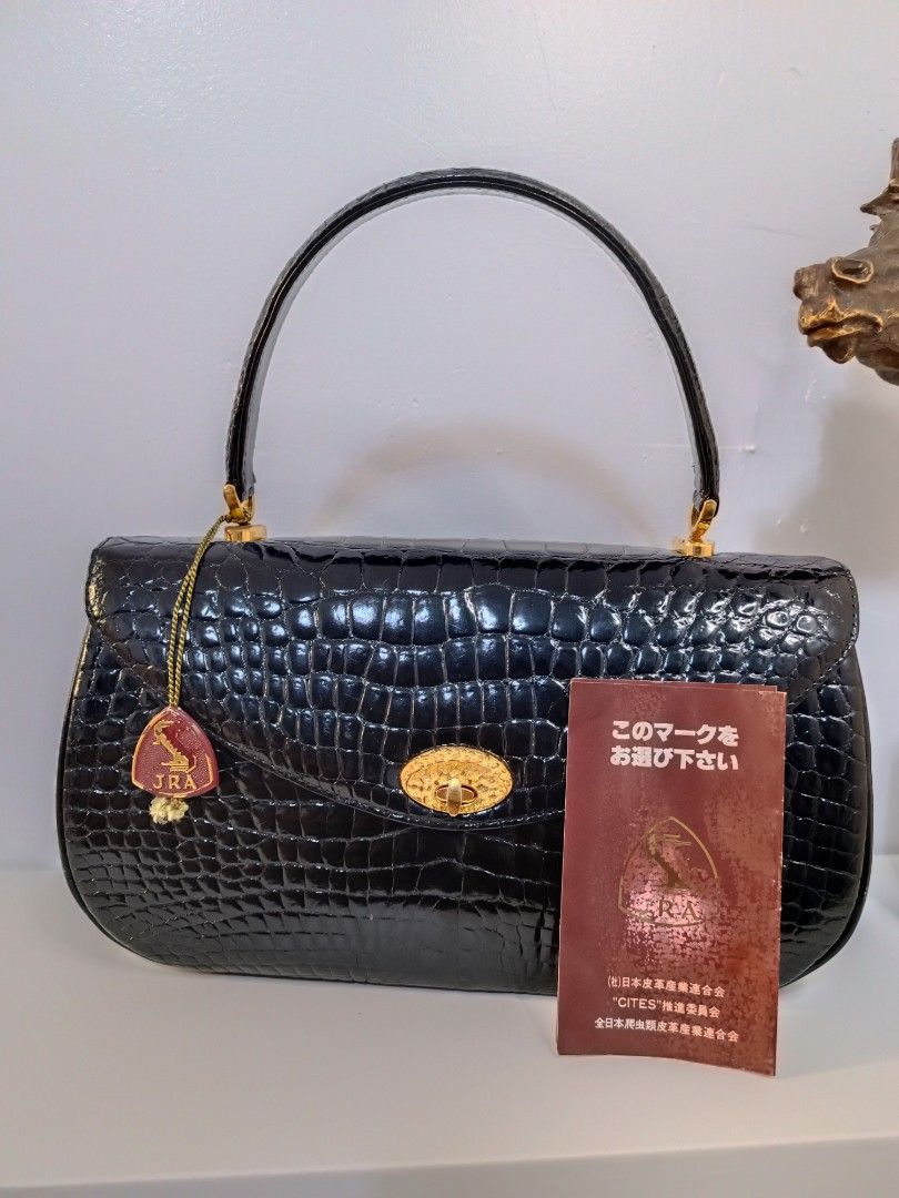 JRA crocodile bag (Category: Luxury Bags & Wallets) located in Malabon City. Submitted by mistej_restoration (Listing ID 1231602998, Image 1). Description: good condi free sling.