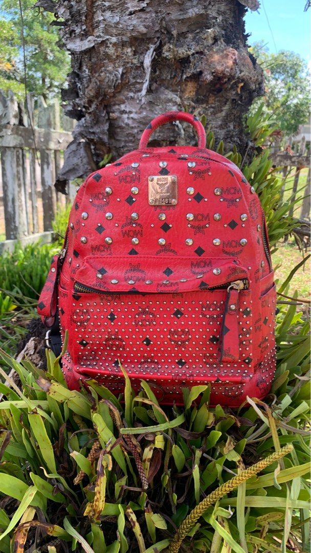All red mcm backpack hotsell