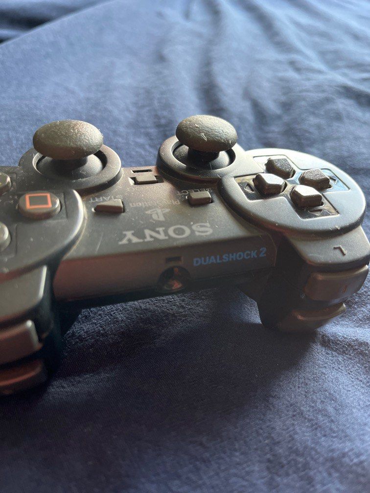 PS2 Controller (Category: Controllers) located in Singapore. Submitted by charliebrownie (Listing ID 1231504117, Image 3). Description: Not for use, collectible purpose.