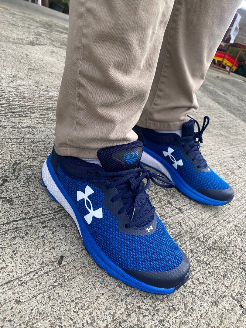 Under armour blue and white shoes top