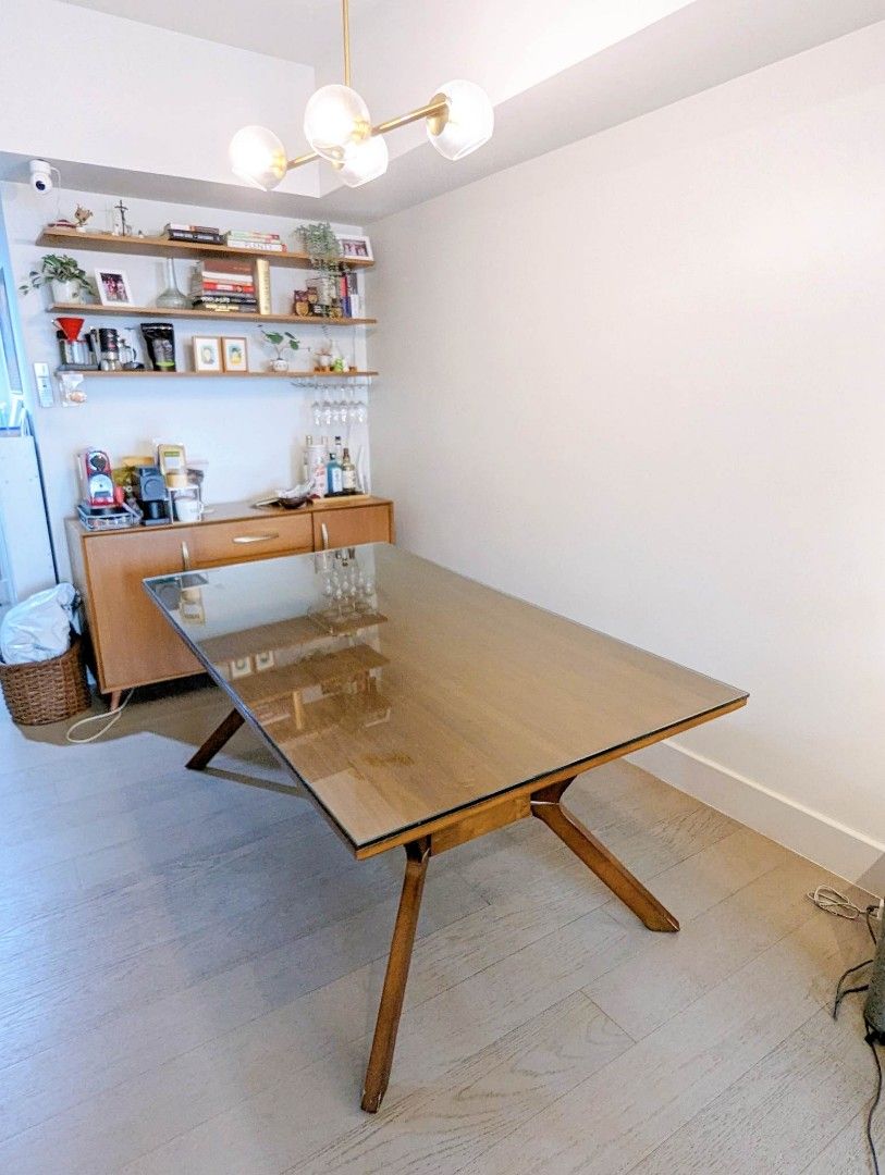 Wood table with glass top on Carousell