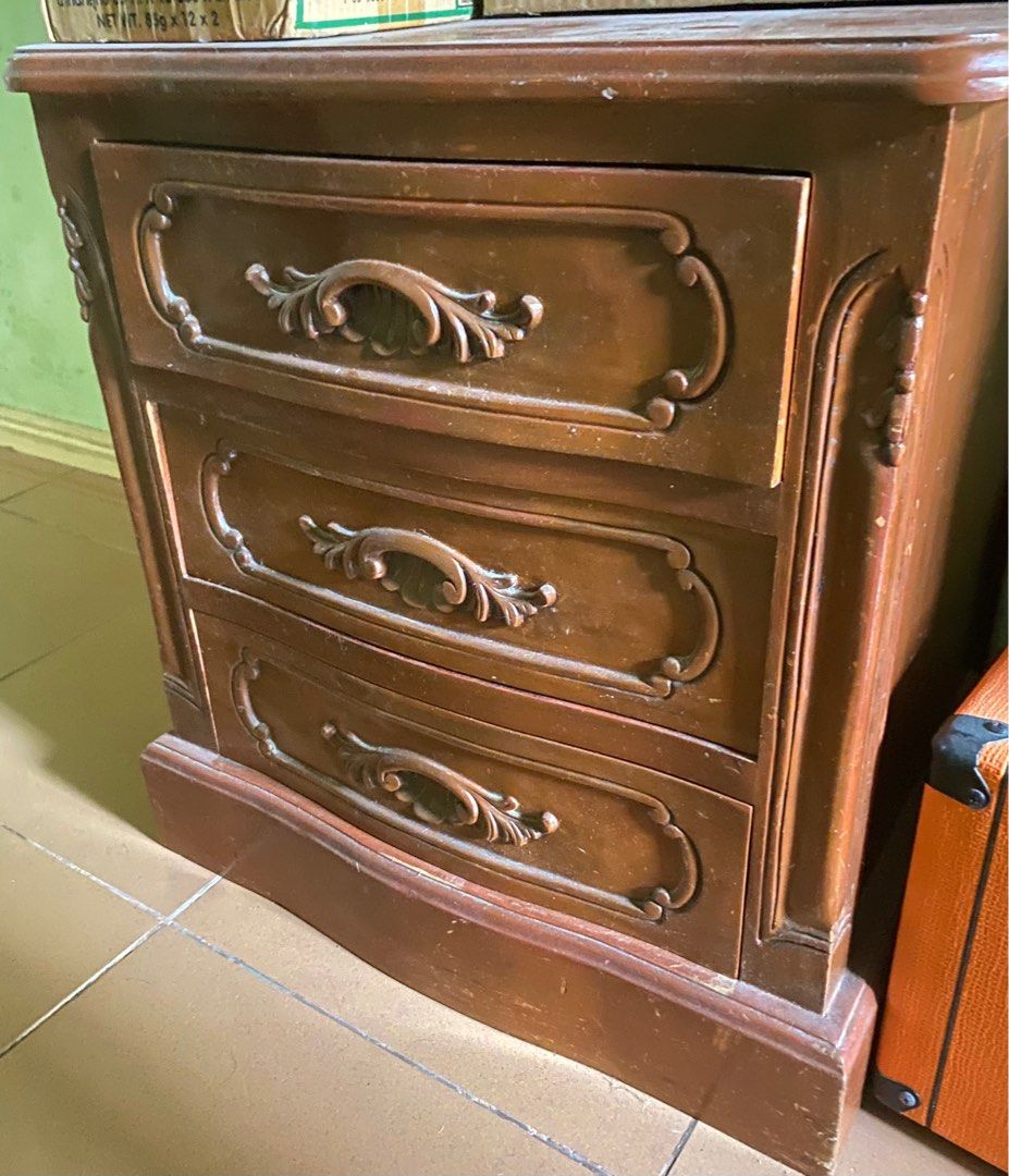 (2) Narra Bed Side Table with 3 drawers (Category: Tables & Sets) located in Manila. Submitted by aplt00 (Listing ID 1231653323, Image 2). Description: RUSH SALE (2) Narra Bed Side Table with 3 drawers 23in x 21.5in Issues with drawer alignment Php 5,000 each Negotiable to sure buyers Available for pick up and delivery (your preferred courier).