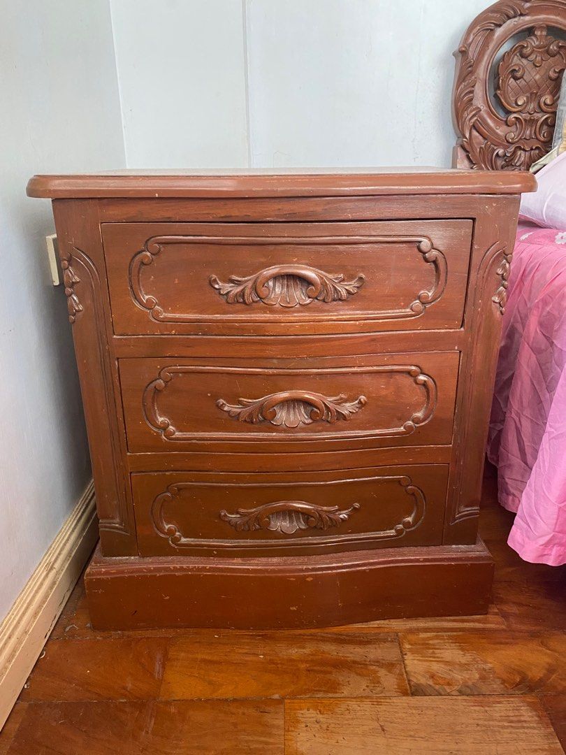 (2) Narra Bed Side Table with 3 drawers (Category: Tables & Sets) located in Manila. Submitted by aplt00 (Listing ID 1231653323, Image 1). Description: RUSH SALE (2) Narra Bed Side Table with 3 drawers 23in x 21.5in Issues with drawer alignment Php 5,000 each Negotiable to sure buyers Available for pick up and delivery (your preferred courier).