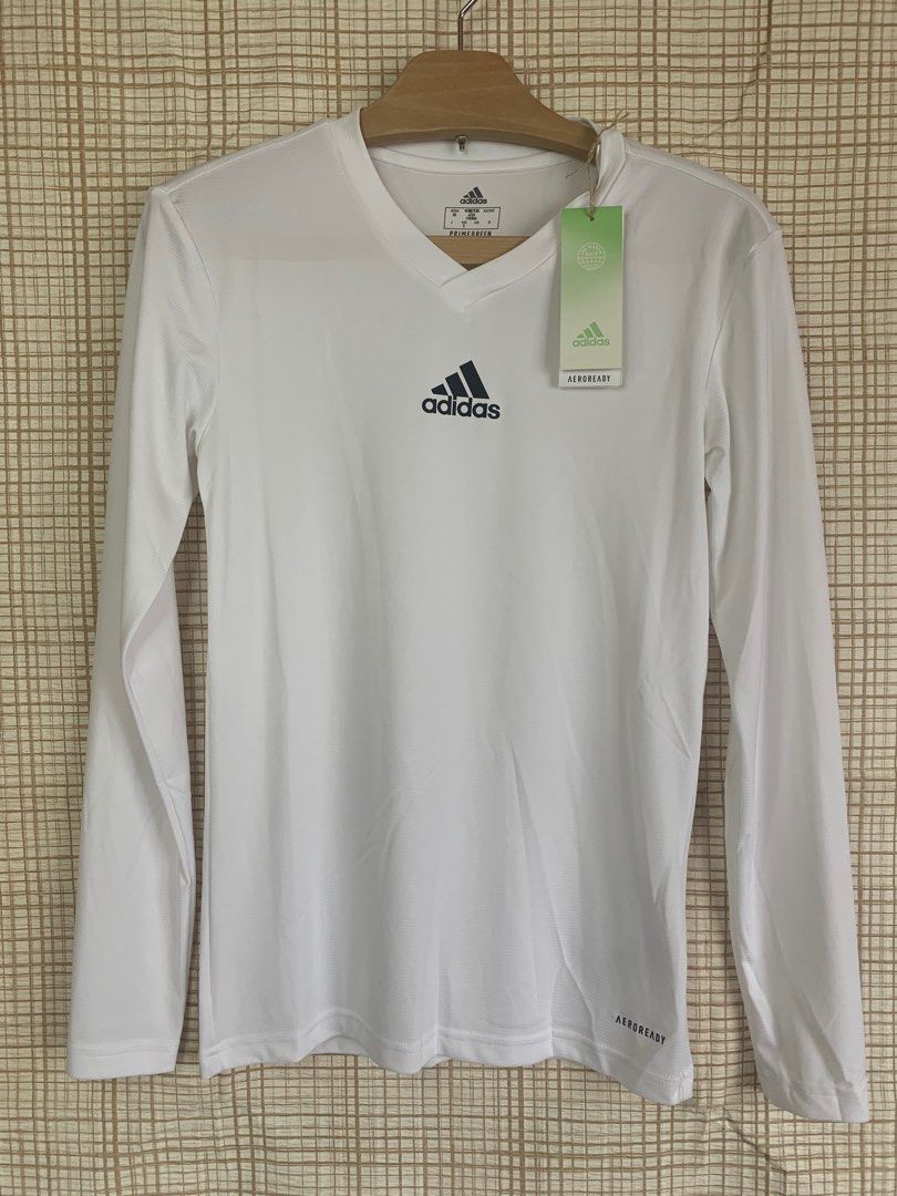 Adidas Aeroready Quick Dry Long Sleeves Base Layer (Category: Activewear) located in Baguio. Submitted by THRIFThingWars (Listing ID 1231621265, Image 2). Description: Size on Tag: Small Chest: 16" Length: 25" ✅ thin, airy T-shirt with long sleeves ✅ V-neckline ✅ flexible material moisture-wicking AEROREADY technology ✅ made of high quality Primegreen materials recycled ✅ composition: 100% polyester Producer.