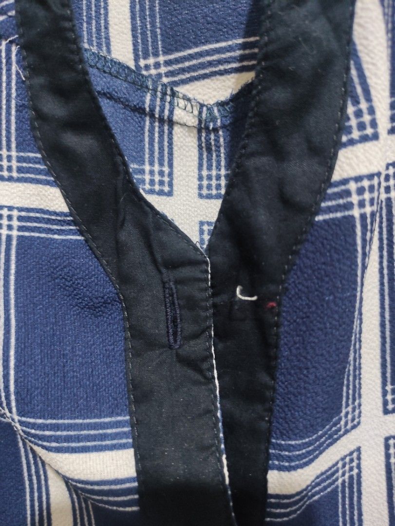 Blue Checkered Sleeveless Blouse (Category: Blouses) located in San Pedro. Submitted by recitea (Listing ID 1231657884, Image 3). Description: I am selling my preloved sleeveless blouse. Very comfortable to use during summer time. Size: Small Flaws:Missing one button. please see 3rd picture.