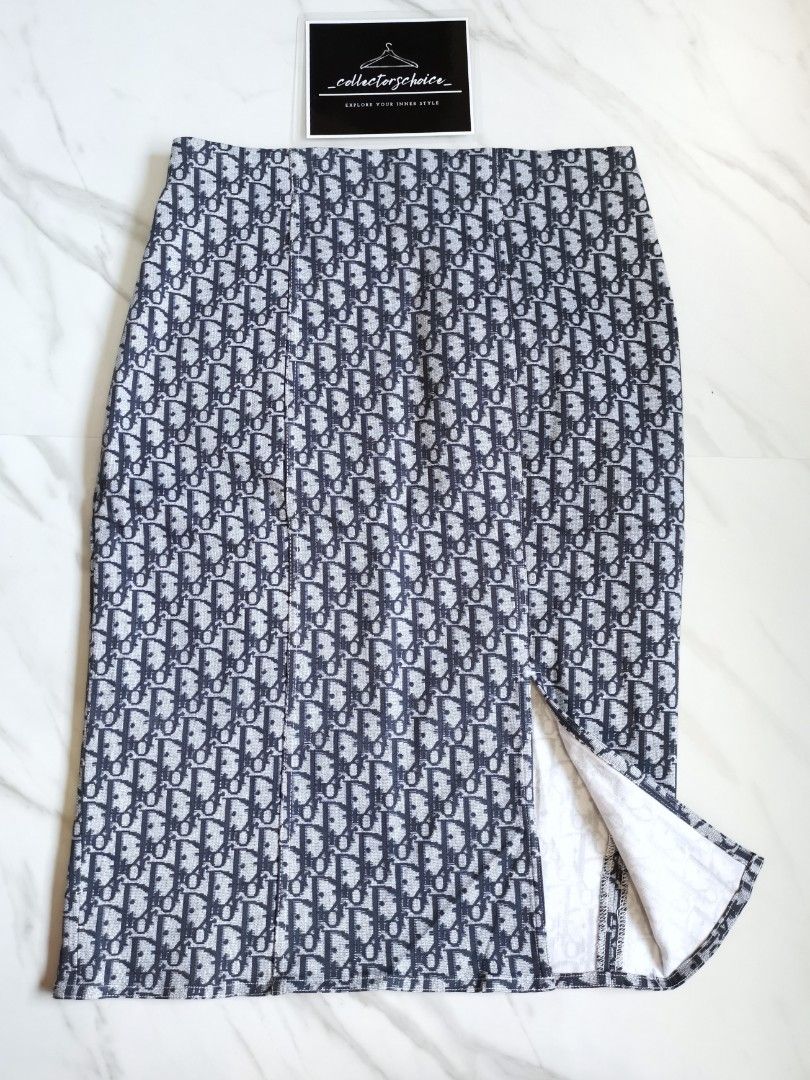 Christian Dior Oblique Skirt (Category: Luxury Apparel) located in Makati City. Submitted by _collectorschoice_ (Listing ID 1231733137, Image 2). Description: ° Retails at $690 ° Oblique monogram ° Cut from stretchy cotton (98%) and lycra (2%) in a thigh-skimming fit, this knee-length skirt is made of the iconic "Dior Oblique" logo print ° It features a high-rise waist to emphasize your narrowest point ° The back hem has a slit, so you can move c