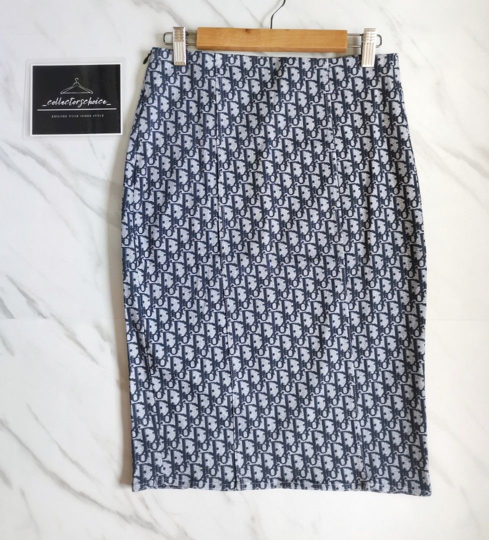 Christian Dior Oblique Skirt (Category: Luxury Apparel) located in Makati City. Submitted by _collectorschoice_ (Listing ID 1231733137, Image 3). Description: ° Retails at $690 ° Oblique monogram ° Cut from stretchy cotton (98%) and lycra (2%) in a thigh-skimming fit, this knee-length skirt is made of the iconic "Dior Oblique" logo print ° It features a high-rise waist to emphasize your narrowest point ° The back hem has a slit, so you can move c