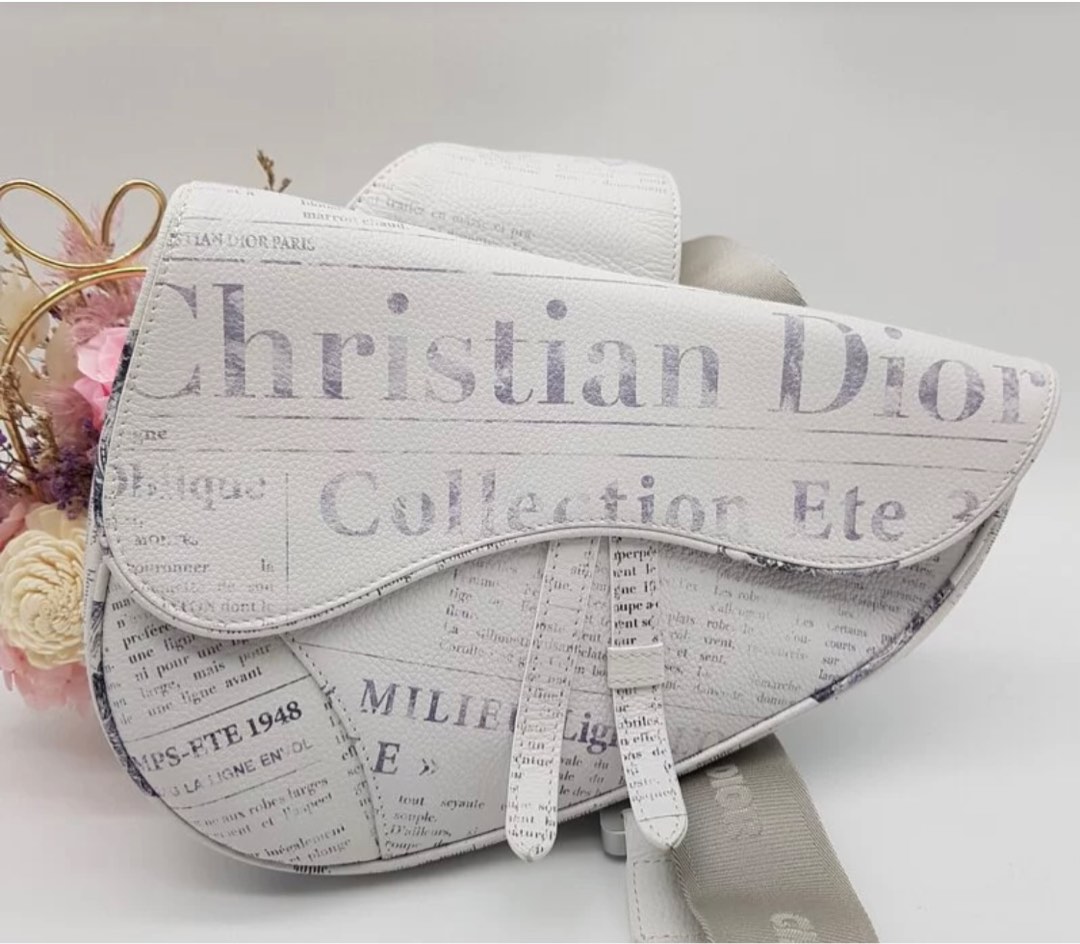 Dior newspaper hotsell print saddle bag
