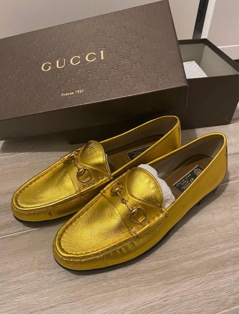 Gucci gold loafer sales