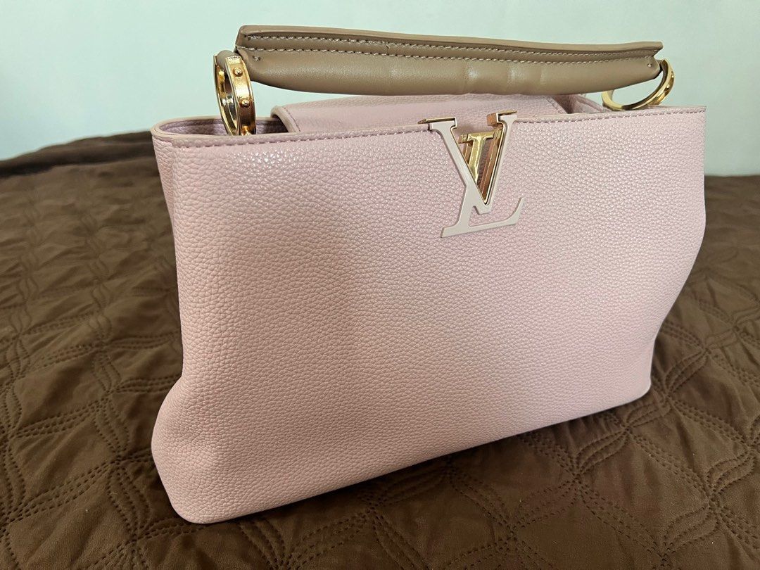 LV Bag (Category: Luxury Bags & Wallets) located in Mandaluyong City. Submitted by jdlreal (Listing ID 1228429588, Image 2). Description: In pretty salmon color 💕 - Used once, like new. - With strap, care card and dustbag - Genuine Leather (See last 2 photos for minimal flaw) .