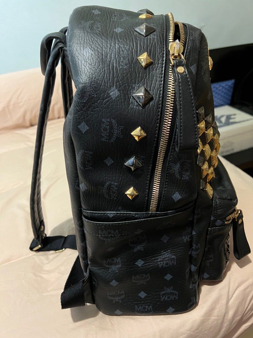 Mcm backpack black best sale with studs