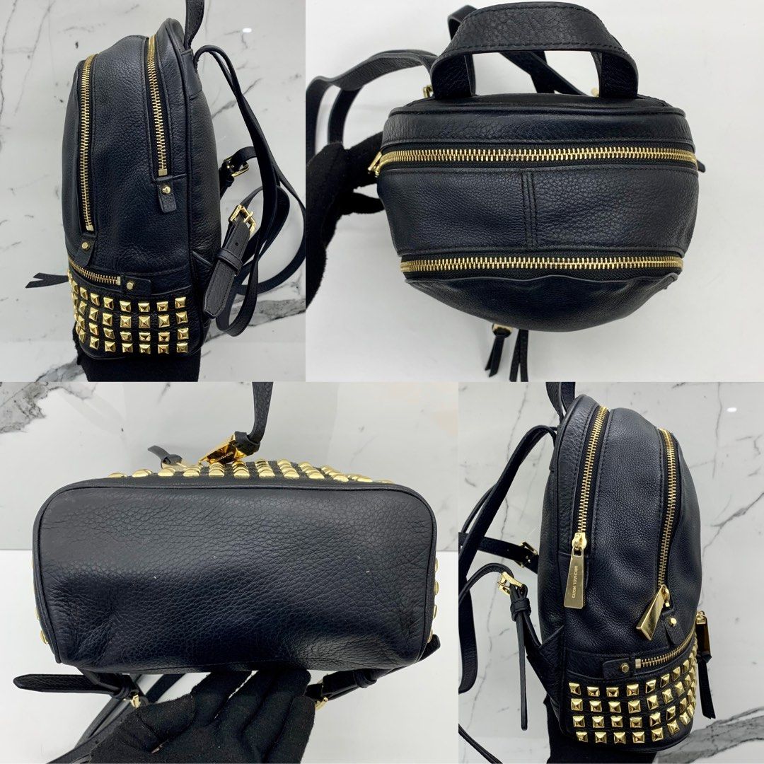 Michael kors black backpack with gold studs deals
