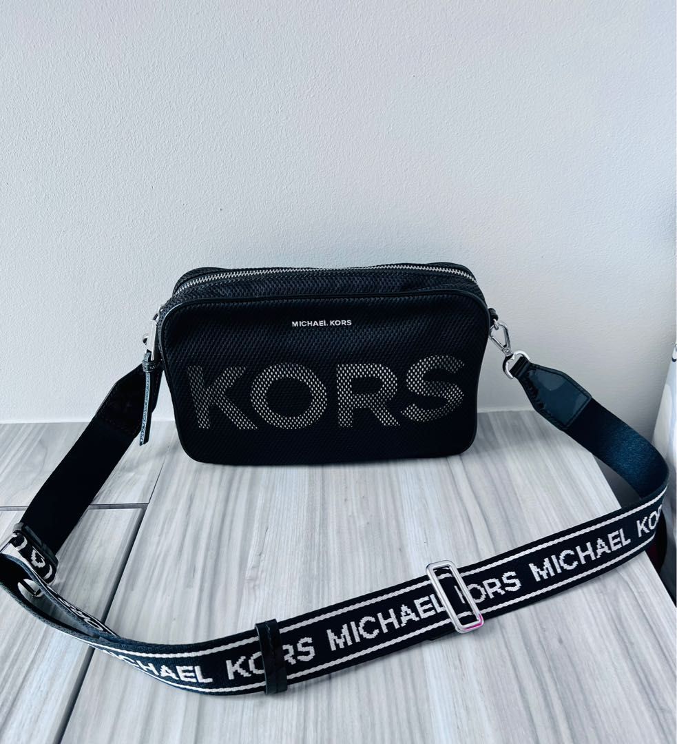 Michael kors logo hotsell tape crossbody bag
