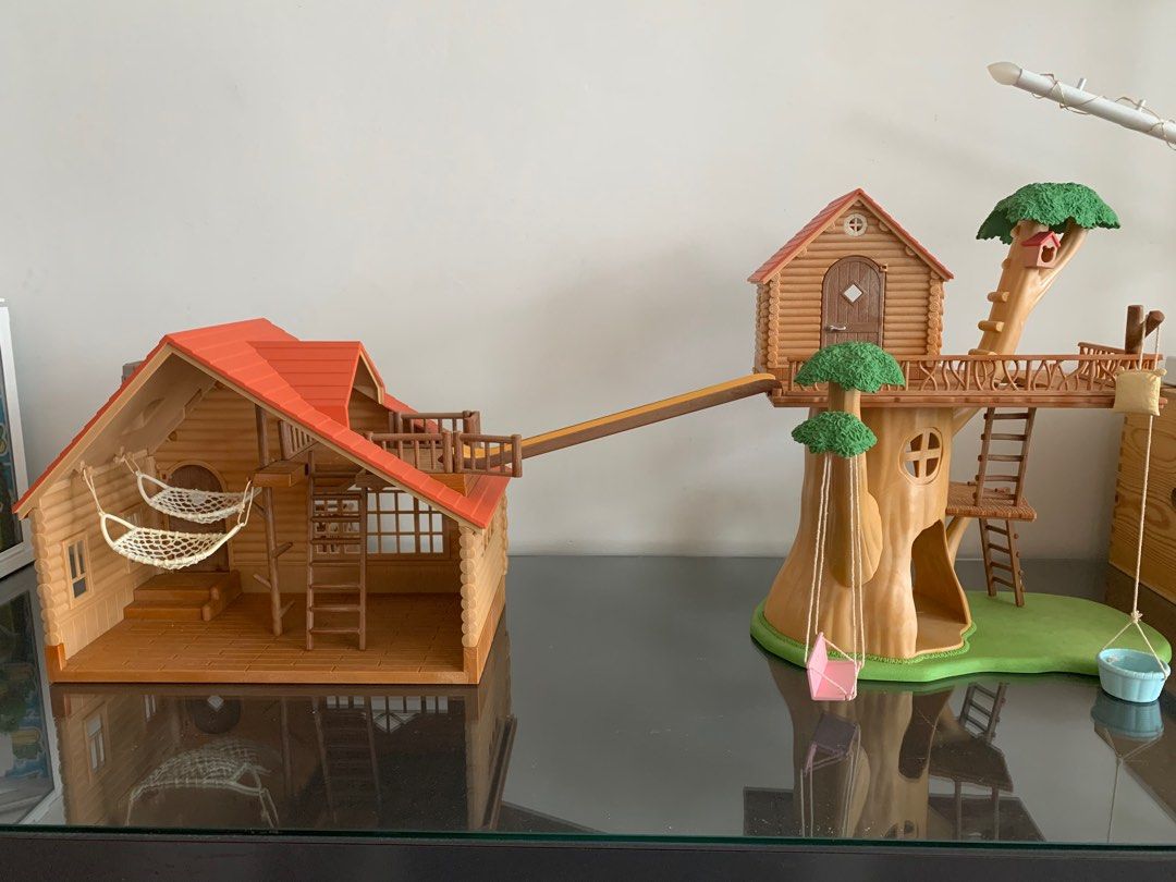 Sylvanian Families Treehouse and Log Cabin