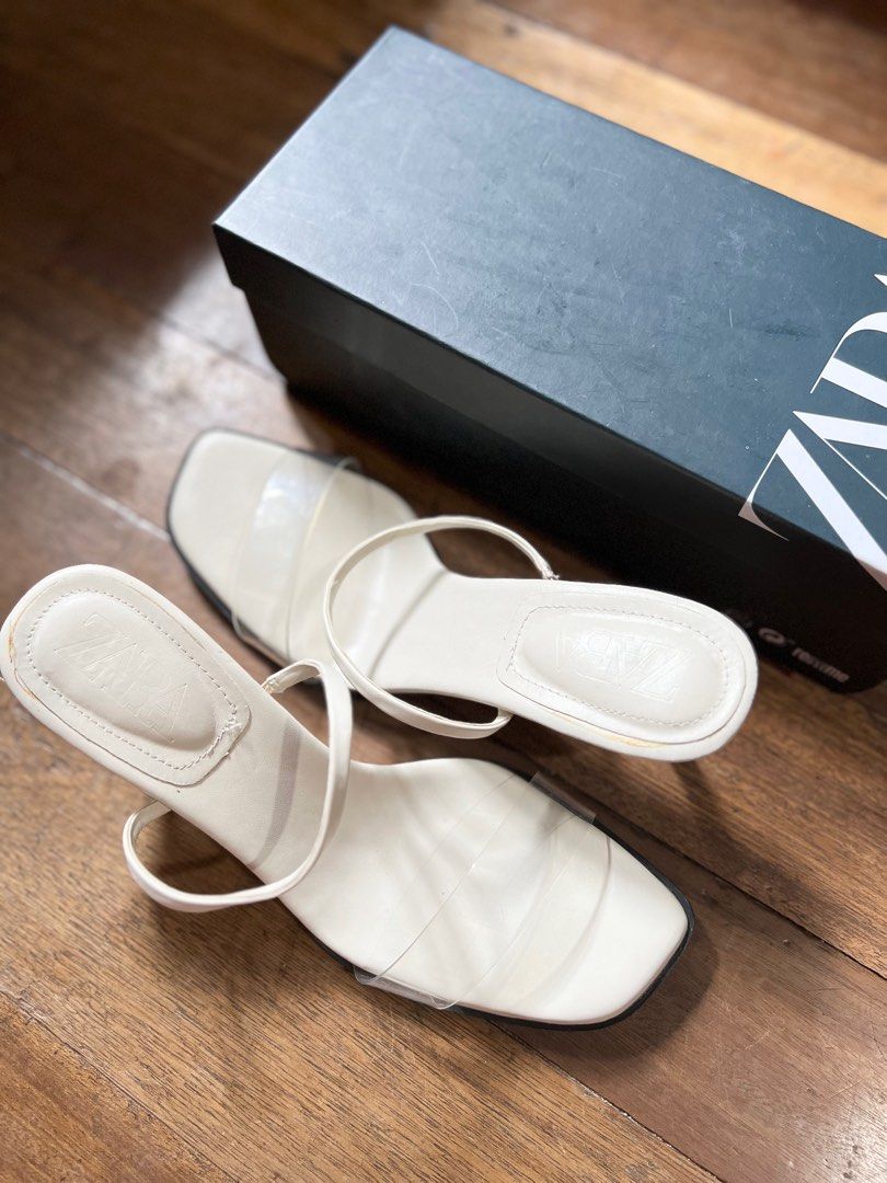 Zara White Transparent Sexy Heels (Category: Heels) located in Makati City. Submitted by assortedhauls (Listing ID 1231639208, Image 2). Description: Last price posted Used 2x (1x indoor, 1x outdoor) Size 39, 24.5cm Mid-size heels Comfy to wear Gives sexier fit even on wide feet.