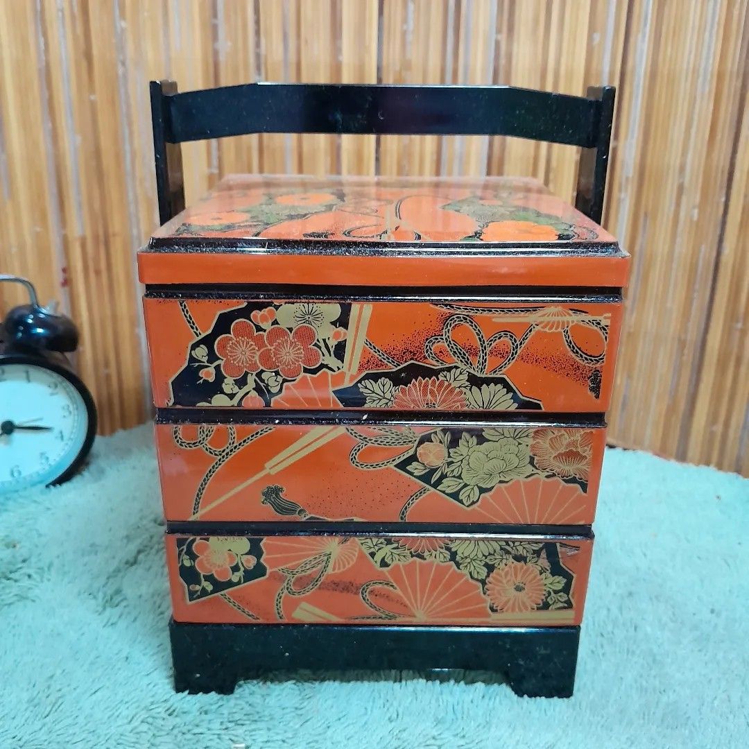 3 Layer Bento Box with Tray and Holder (Category: Storage Boxes & Baskets) located in Malolos. Submitted by jestrelita (Listing ID 1231948574, Image 1). Description: 3 Layer Bento Box with Tray and Holder P250 only - a combination of black, orange, and gold design - brand new with small chips at the bottom layer (see photos, still reusable) - good condition 🇯🇵🏯👘👺🗾🍱🎎🍜🍙.