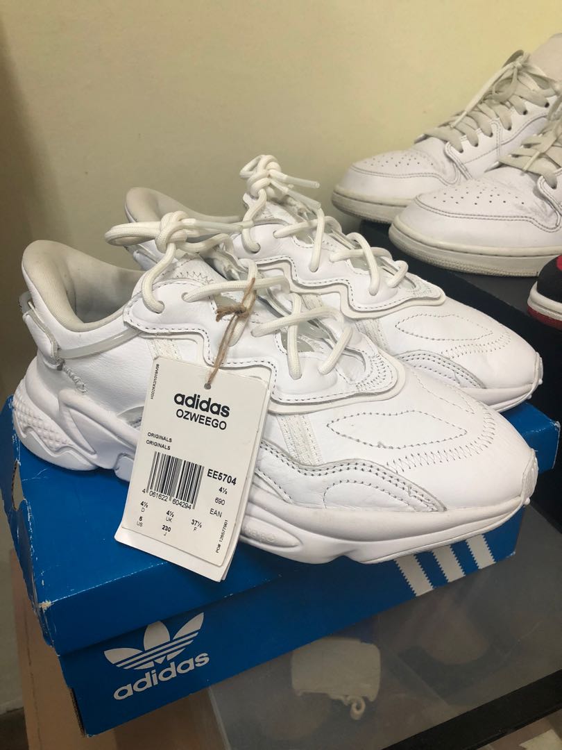 Adidas ozweego triple white US6 women Women s Fashion