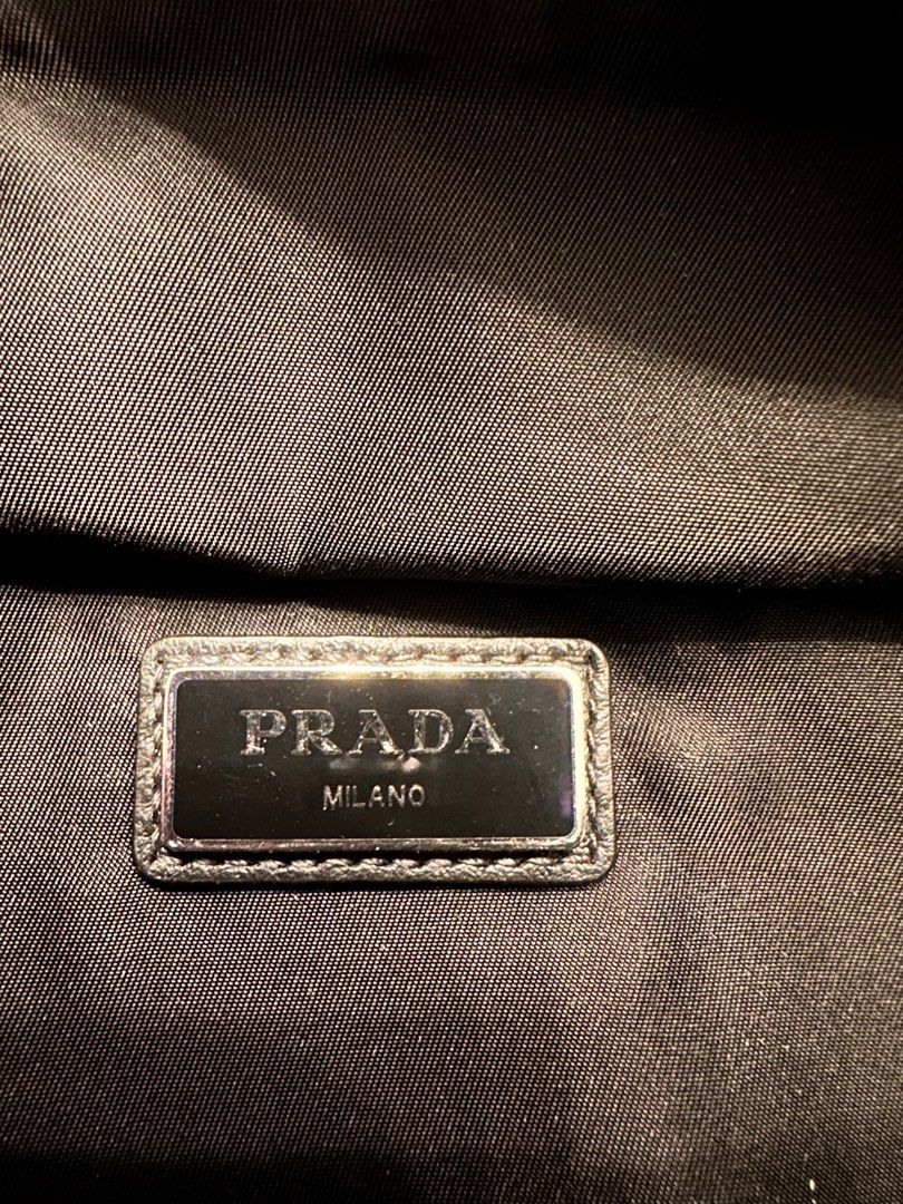 Prada Men bum bag (Category: Bags & Wallets) located in Singapore. Submitted by mangoberry (Listing ID 1231948741, Image 3). Description: Authentic men’s bumbag. Impulse buy. Bought in Prada boutique in Korea. Only carried once. Can use on waist or sling across chest. Perfect condition. Comes with dust bag and card. Top up for courier. .