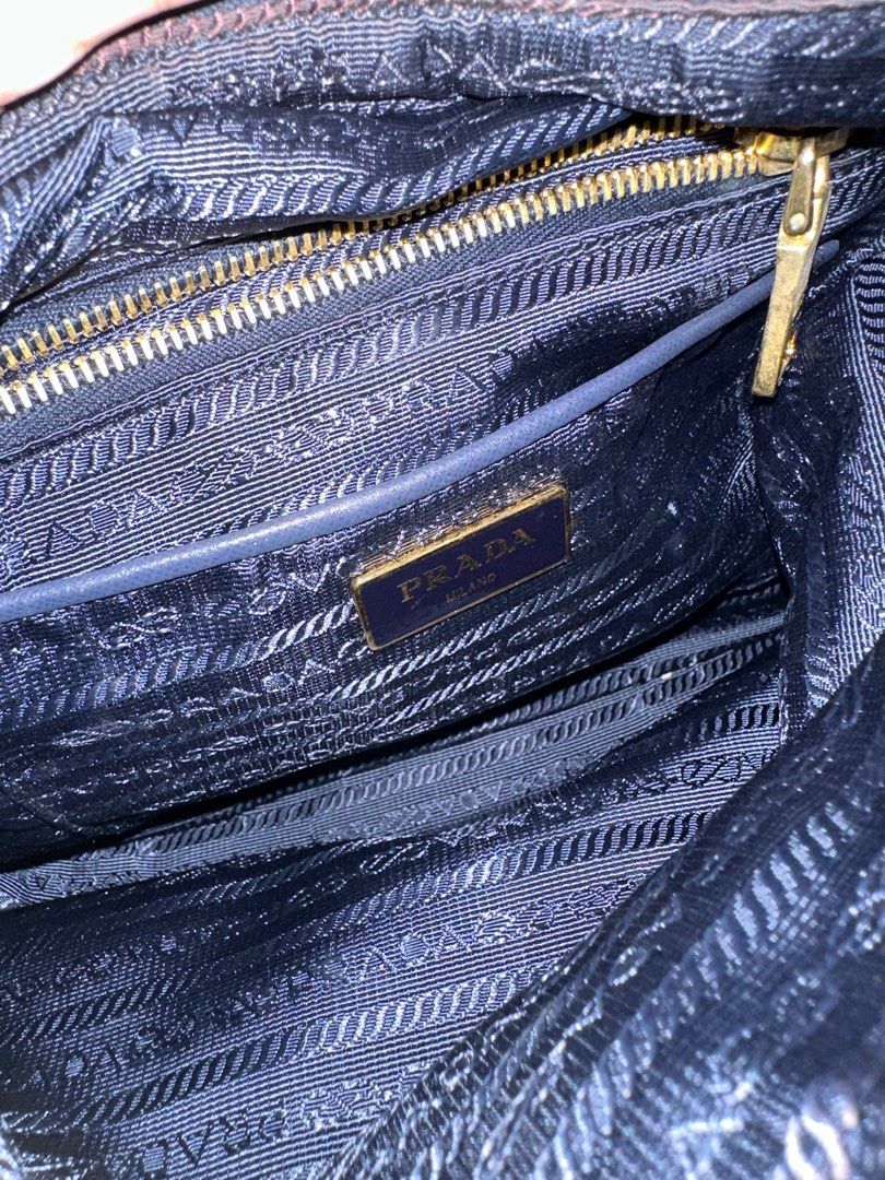 Prada navy blue nylon sling bag, Luxury, Bags & Wallets on Carousell