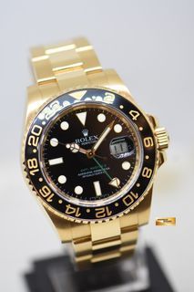 ROLEX OYSTER GMT-MASTER II 18K YELLOW GOLD IN OYSTER BRACELET BLACK DIAL 116718LN (MINT)