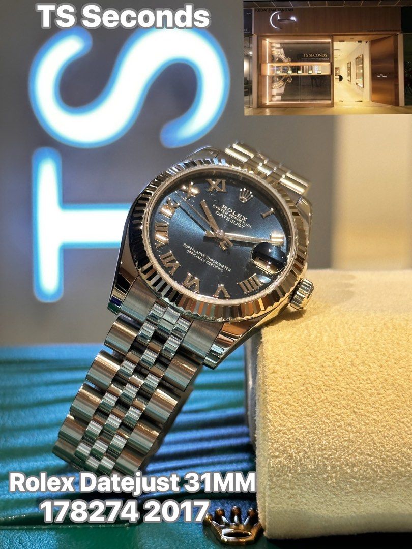 Used like new Rolex Datejust 31 178274 Blue Roman Dial Fluted
