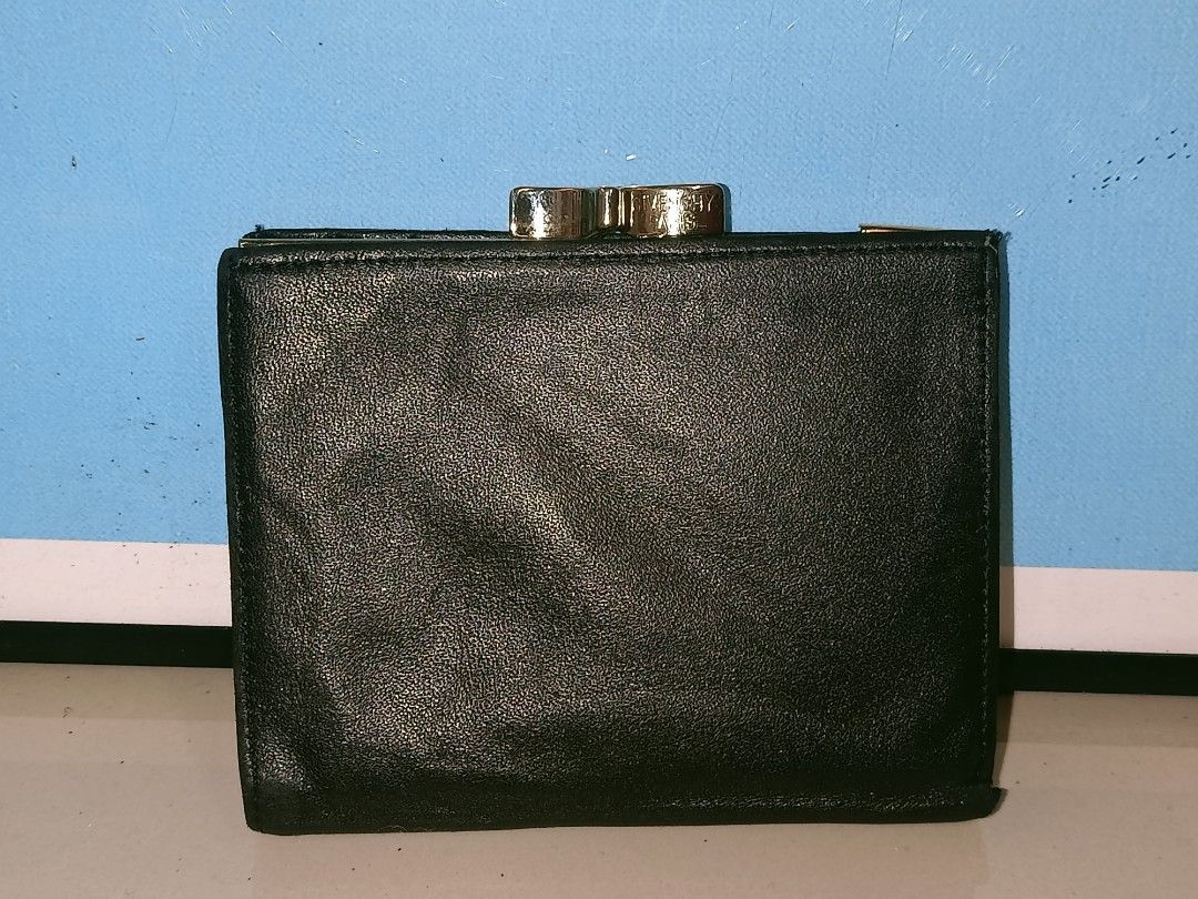 Vintage Givenchy compact wallet (Category: Luxury Bags & Wallets) located in Taguig. Submitted by jhonnybusinessph (Listing ID 1231850010, Image 2). Description: For sale Vintage Givenchy compact wallet w/ card holder Authentic condition: GOOD USED issue: may minor fadings dun sa coin slot and paper money compartment (see pics) super goods pa nito! selling as is P850 + sf only location: Metro Manila dm.