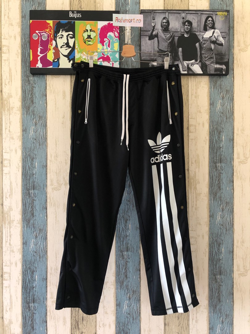 Penneys €5 version of the classic 90s Adidas button trousers | Her.ie