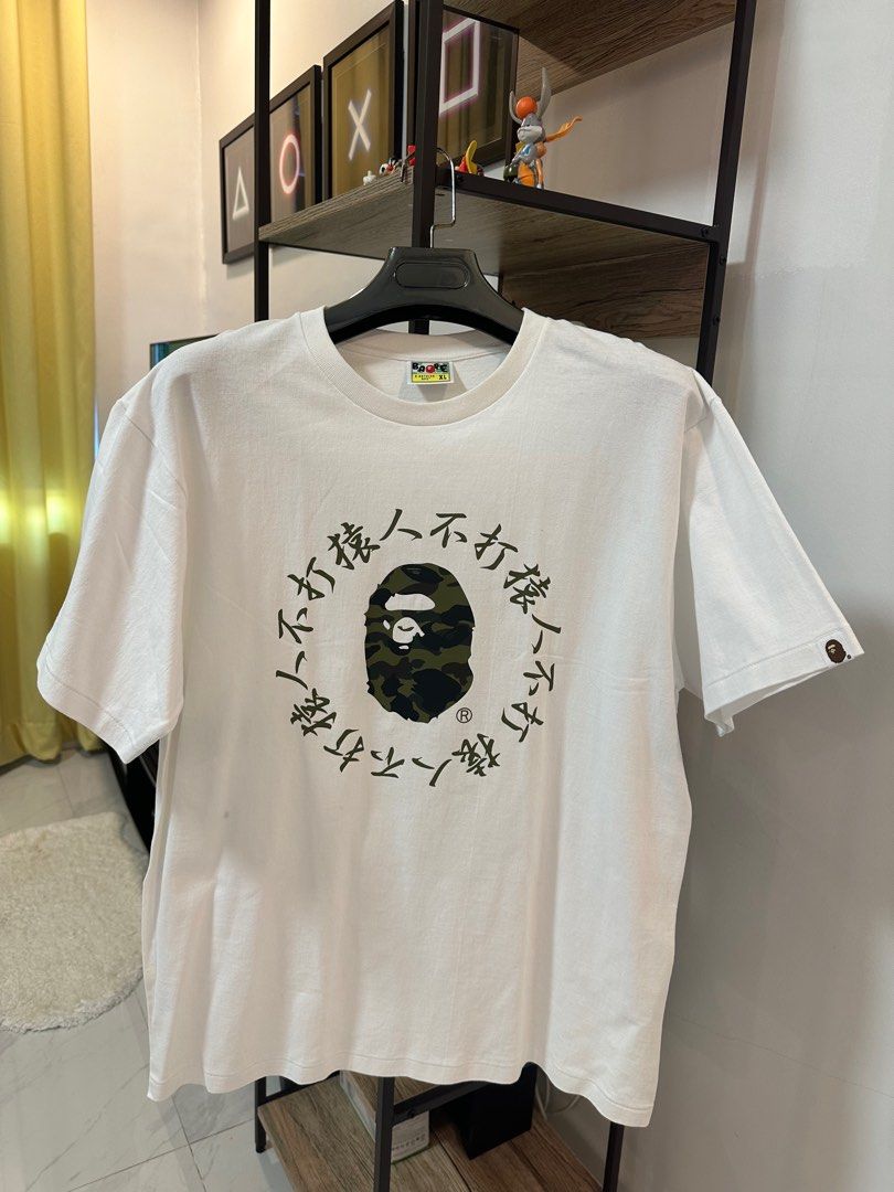 Bape tee camo head with Jap letters (Category: Tshirts & Polo Shirts ) located in Laoag. Submitted by dmtcda (Listing ID 1232132488, Image 1). Description: 23x29cm Brandnew deadstock.
