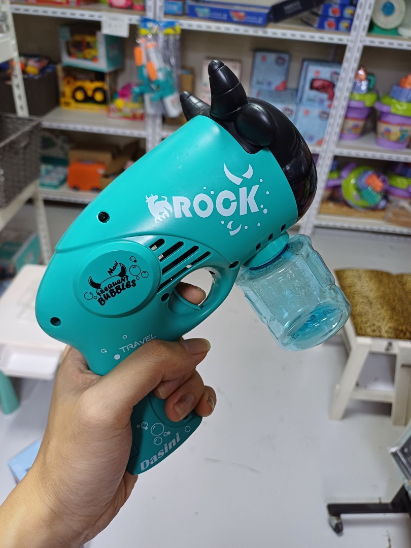 BRAND NEW Bubble Gun Toy with Music + Free 10pkts Bubble concetrate